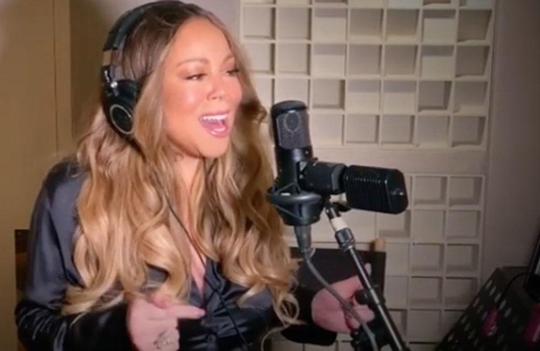 Mariah Carey performs Always Be My Baby with 'fan' blowing her hair