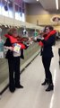Girls Play Sad Violin Near Empty Toilet Paper Aisle in Store