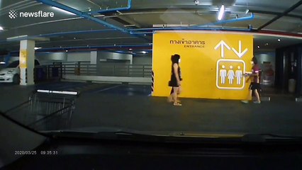 Thai woman caught using foot to push lift button amid COVID-19 pandemic