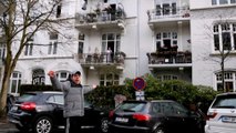 Fitness trainer in Germany leads free balcony exercises to fight social distancing blues