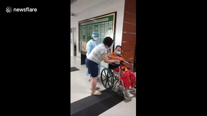 Heartwarming moment 58-year-old coronavirus patient returns home after beating illness in the Philippines