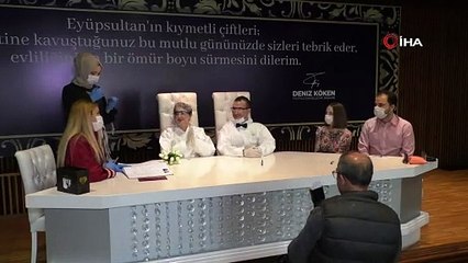 Gelinlik ve damatlık yerine medikal tulum giyerek evlendiler