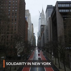 In show of solidarity: New York residents applaud hospital staff during shift change