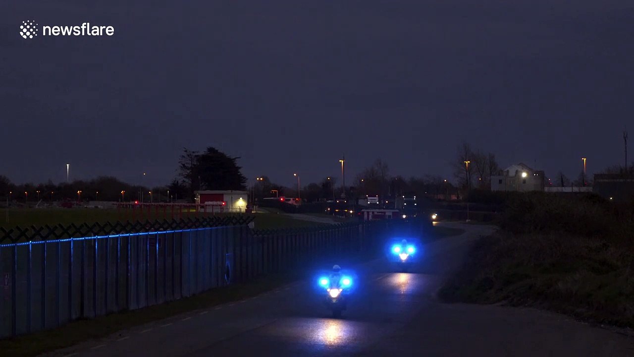 COVID-19: Irish police and army escort PPE from Dublin Airport at night