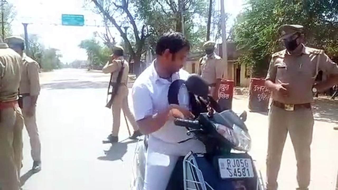 मथुरा: पुलिस ने रखी राजस्थान बॉर्डर पर निगरानी, लॉकडाउन उल्लंघन करने वालों के काटे चालान