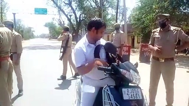 मथुरा: पुलिस ने रखी राजस्थान बॉर्डर पर निगरानी, लॉकडाउन उल्लंघन करने वालों के काटे चालान