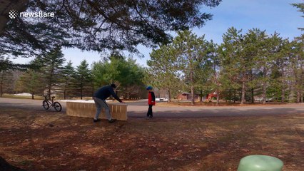 'Shreddin' the gnar!': Father, kids and dog test out homemade ramp during coronavirus lockdown boredom