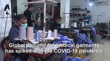 Coronavirus: Gaza factory makes healthcare garments for protection