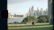 A Couple In A Park Overseeing Sydney City Skyline And The Opera House