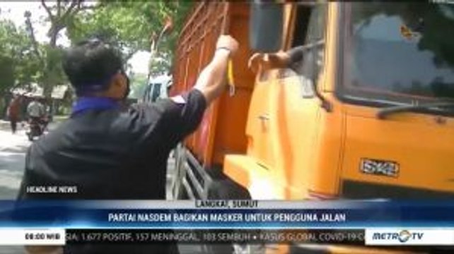 NasDem Langkat Bagikan Masker Gratis ke Pengguna Jalan