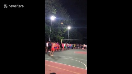 Chinese men play volleyball with plastic chairs and it's oddly impressive