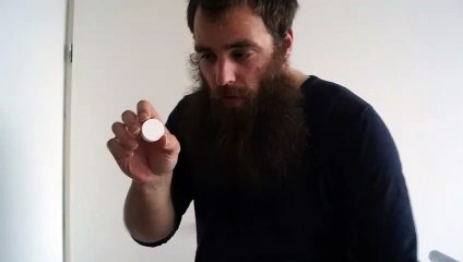 Making a hole in a cap with my thumb nails