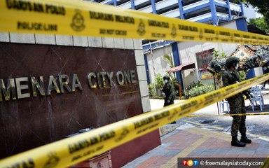 Lockdown downtown: Covid-19 strikes KL condo