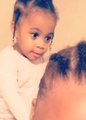 Toddler Looks Shocked When Mom's Wig Comes Off While She Brushed Her Hair