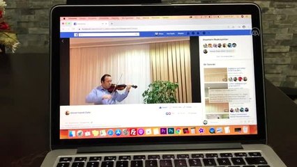 Rektör yardımcısı, evlerinden çıkamayanlara kemanıyla moral veriyor