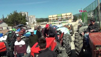 ADANA Kozan'da köylüler traktörlerle ilçeyi dezenfekte etti