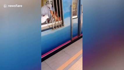 Woman handcuffed to train window in Thailand after alleged 'spitting rampage' through carriage
