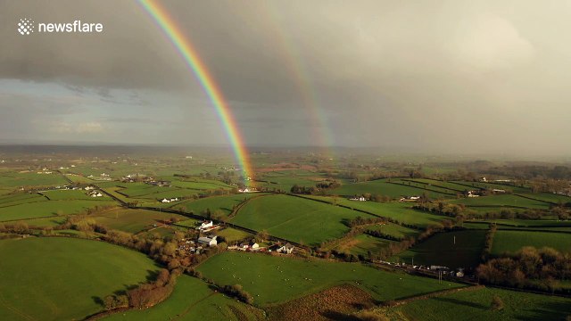 'Ray of hope': Beautiful drone footage captures double rainbow over locked down UK