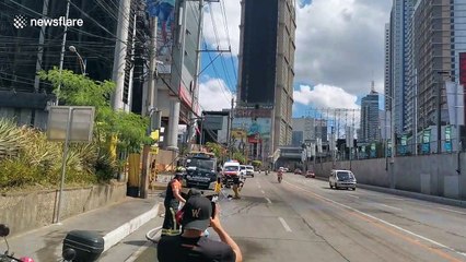 'Drive-by memorial' for medical staff killed in plane explosion in the Philippines