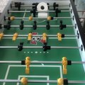 Guy Does Amazing Trick With Toilet Paper Roll While Playing Foosball