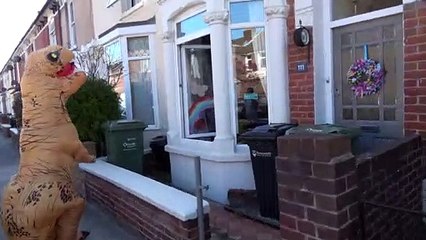 Hannah Pilcher bringning joy to children in Portsmouth dressed up as a dinosaur