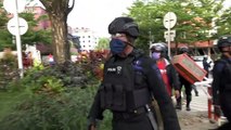 Police in Indonesia city disperse crowds gathering in cafes and restaurants during COVID-19 pandemic