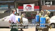 Coronavirus: Myanmar military helps disinfect Yangon’s streets