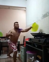 Funny man  cooking food during coronavirus quarantine day lockdown