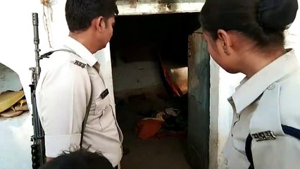 Mother hanging on a noose with two children