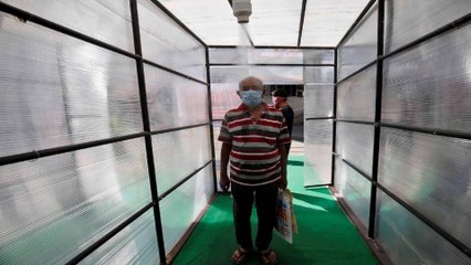 Coronavirus: CRPF sets up tunnel to sanitise themselves