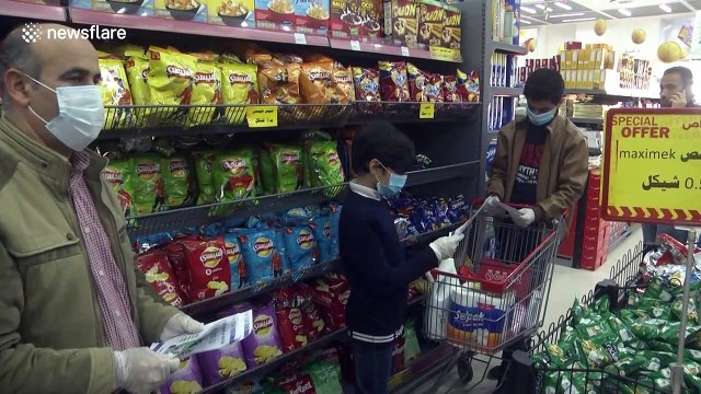 Gaza Strip community group transform into 'coronavirus characters' to spread awareness