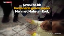 Sağlık çalışanı kendisine sarılmak isteyen torununu uzaktan sevdi