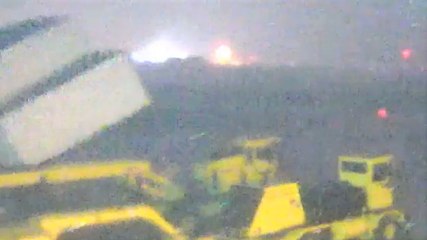 Storm blows away airport hangar