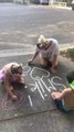 Family Draws on Sidewalk to Encourage People to Smile During Coronavirus Pandemic