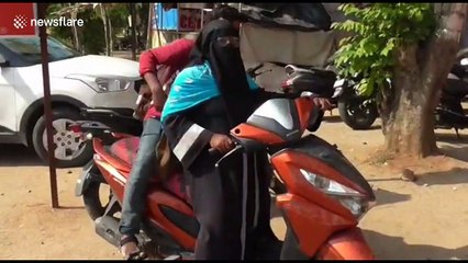 Indian mother takes 1,400 km scooter trip to return stranded son