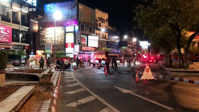 Thai police guard checkpoint to enforce nighttime coronavirus curfew