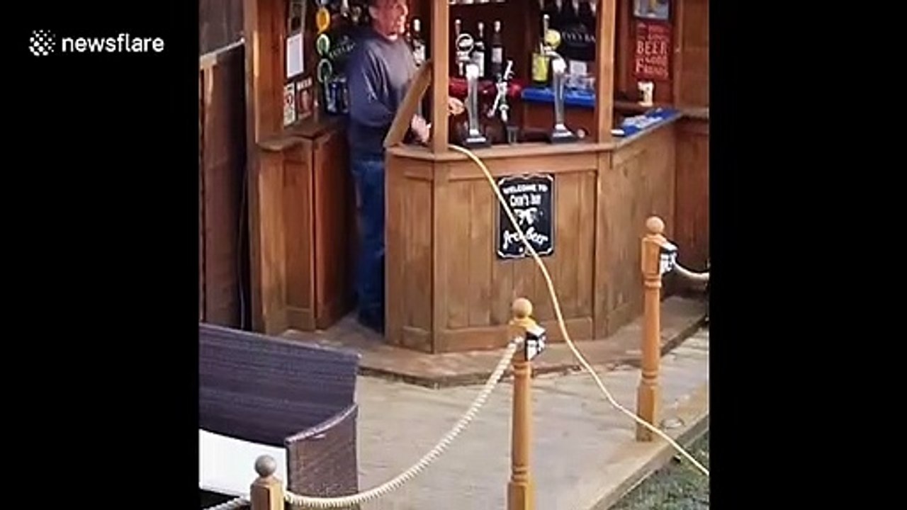 'Going down the pub': Guy finds crafty way to drink at bar while self-isolating
