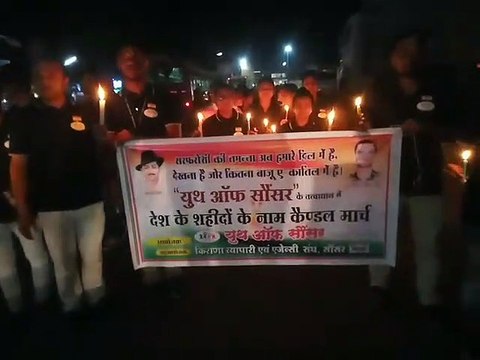 Candle march organized and paid tribute to the martyrs of Pulwama
