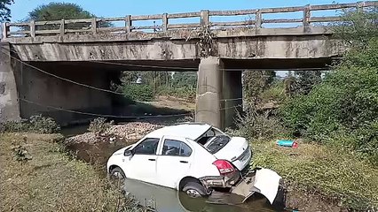 Car fell below pool, driver stuck in car