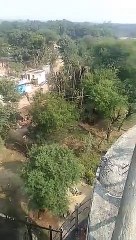 A young man climbed a 70-foot-high tank