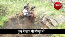 A man risks his life to save peacock trapped in deep well