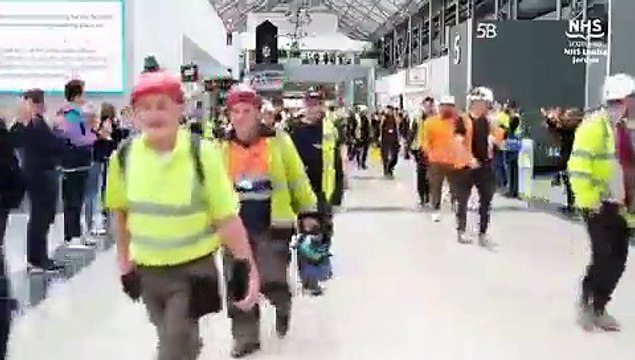 NHS staff clap for construction workers at NHS Louisa Jordan