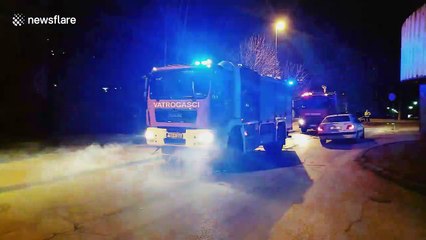 Workers disinfect deserted Sarajevo streets in COVID-19 fightback