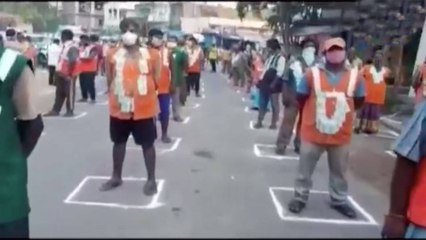 Sanitation workers honoured with Currency Notes Garlands