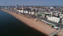 Drone footage shows a deserted Brighton beach