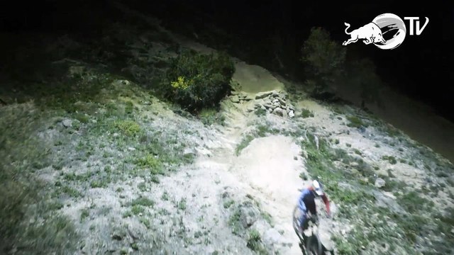 Red Bull racer takes on drone downhill in the dead of night