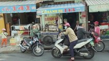 Saigon Street Food Vietnam 2020 - 4$ CHALLENGE What to eat at Le Quang Sung Street - Americans in VN