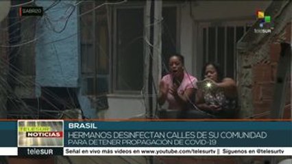 Brasil: ciudadanos desinfectan favela en Rio de Janeiro