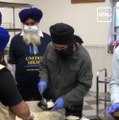 Sikh volunteers prepare over 30,000 meal packets