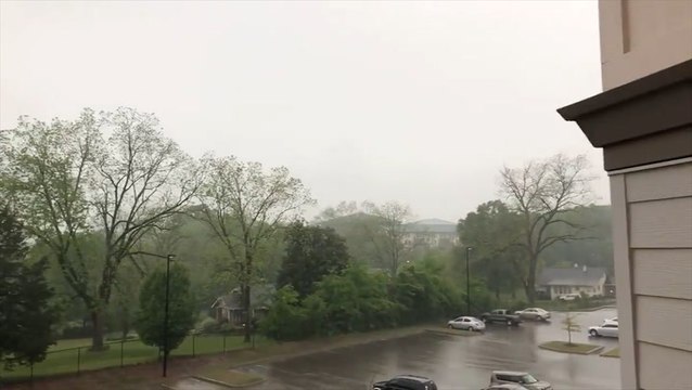 Sirens wail as rain comes down